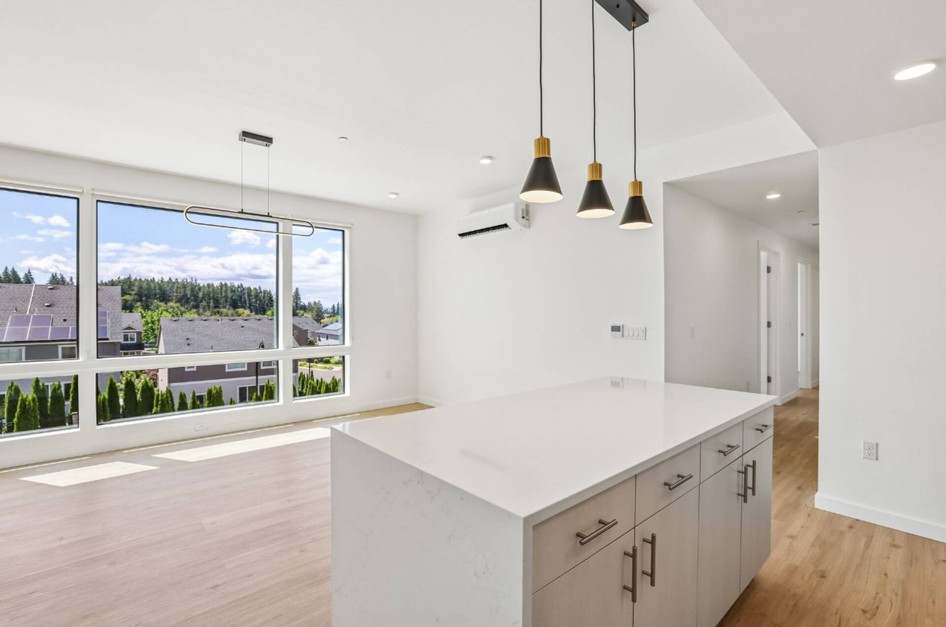 Dining area with pendant lighting and panoramic hillside views