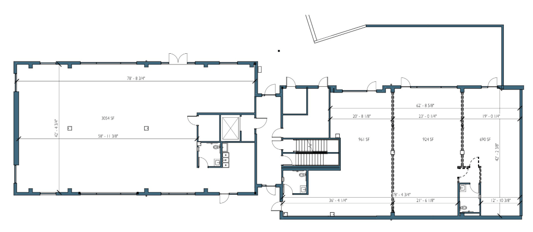 Ground-floor commercial space plan showing Suite W (Unit 101) and Suite E (Units 102, 103, 104) at Abbey Creek Square