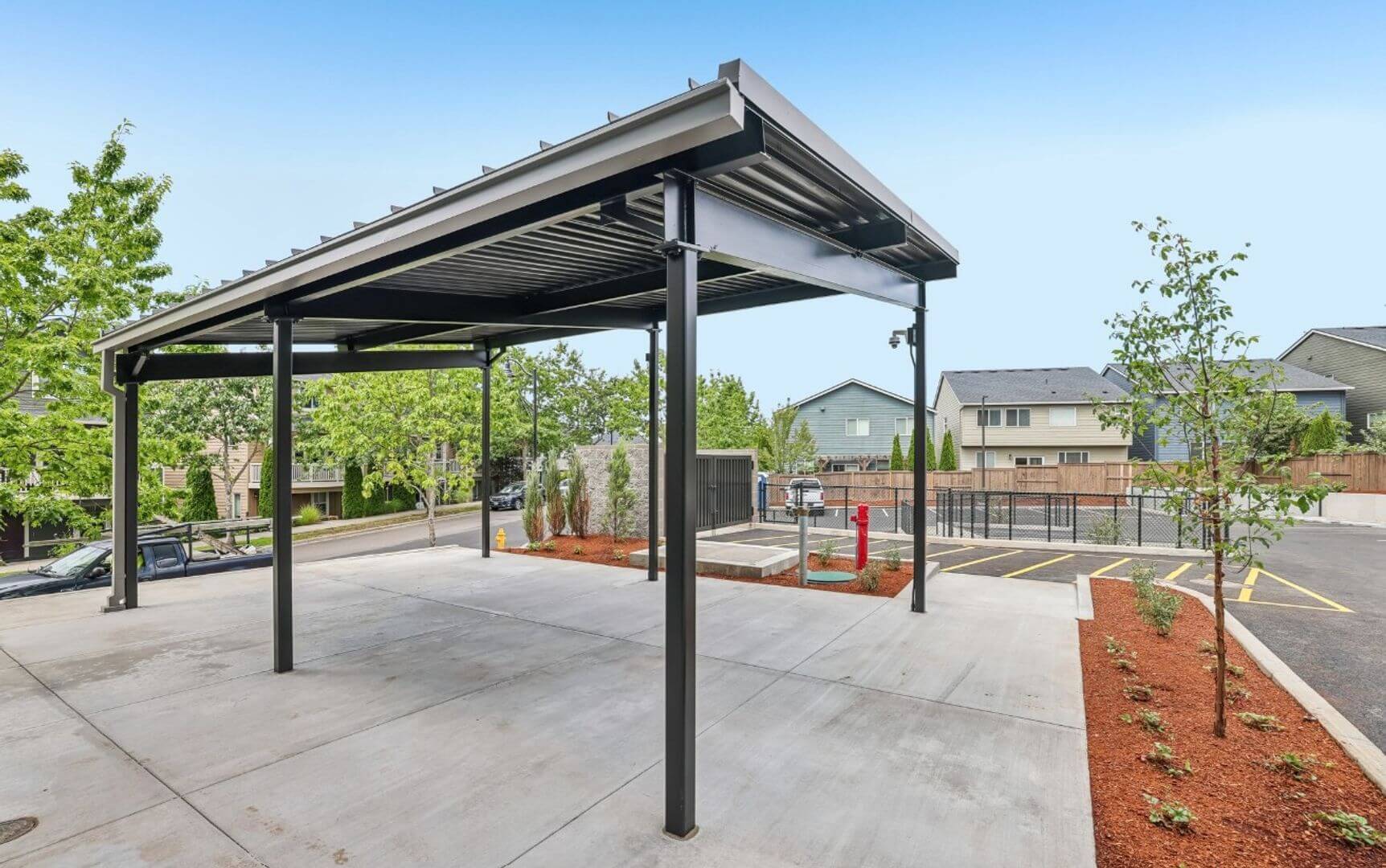 Covered, reserved parking area at Abbey Creek Square